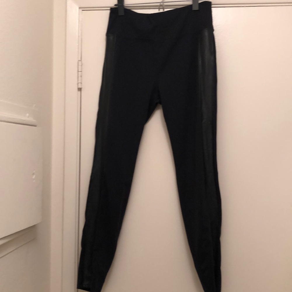 Athleta leggings with side strip size L.